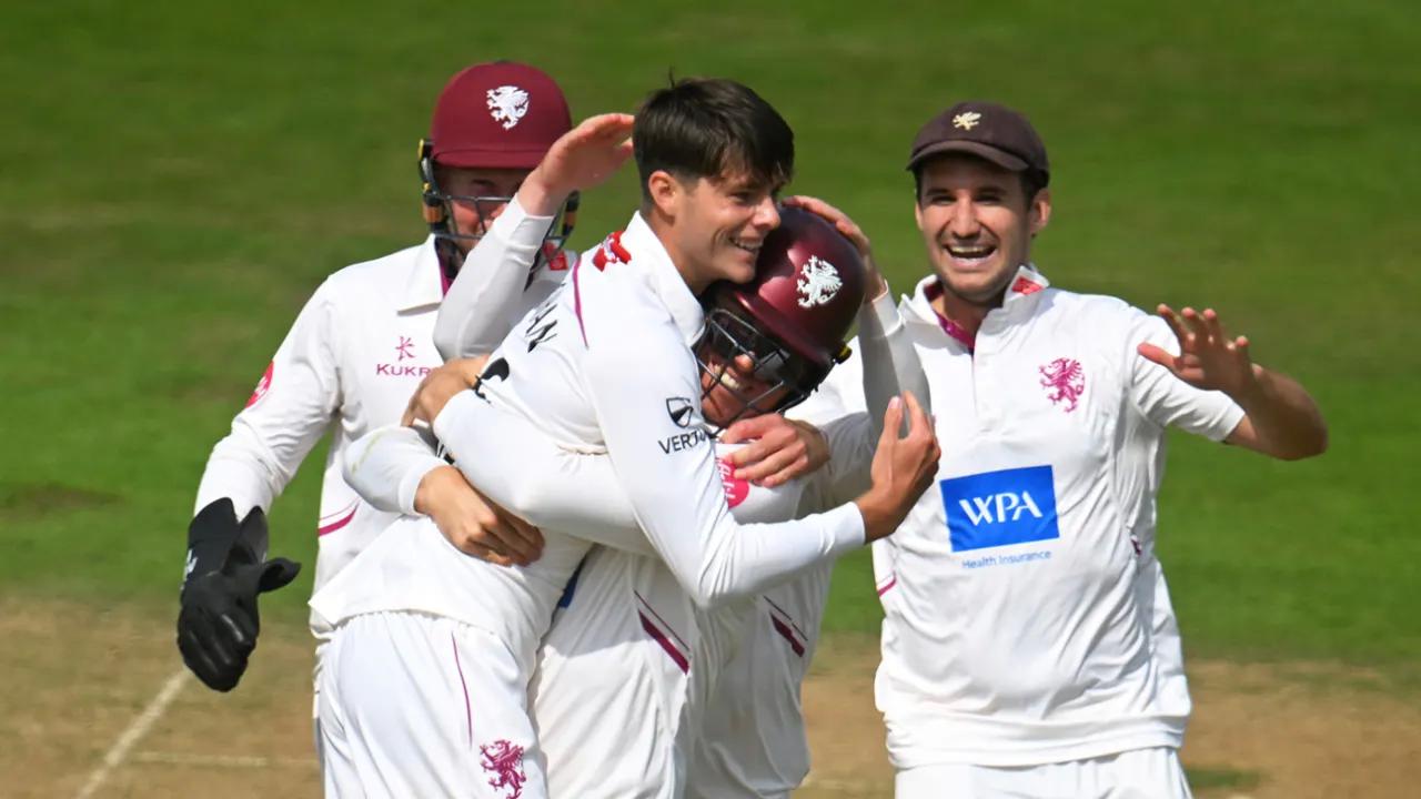 Archie Vaughan celebrates maiden first-class wicket as Somerset spinners shine