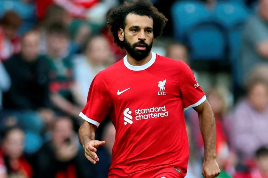 Mark Lawrenson reveals exclusive insights on Liverpool - Gravenberch's potential, Salah's brilliance, and the Saudi takeover, paying tribute to Yeats: An in-depth analysis by Jacob Hansen, Senior Correspondent